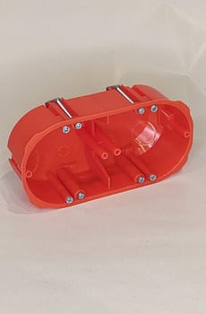 Puszka podtynkowa 2x60mm p/t regips pomarańczowa